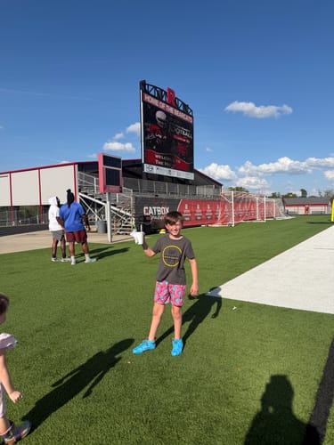 Customer photo review of Kool-Aid 'Mixed Berry' Football Cleats - Quantum Speed by Phenom Elite