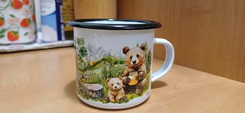Recensione con foto di un cliente su Mamma selvatica- tazza in metallo smaltato
