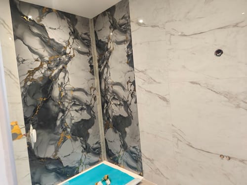 Customer photo review of Panneau Mural PVC Effet Marbre Mystic Bleu Doré - Salle de bain ou Douche