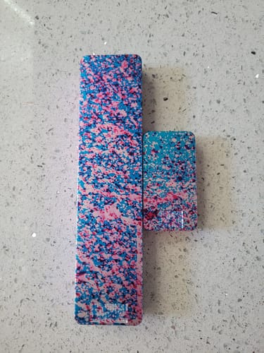 Reviewer's 2-Pack Bundle of colorful metal pill cases shown closed on a counter.