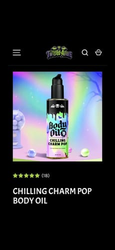 Reviewer's screenshot of the Chilling Charm Pop Body Oil bottle against a colorful background.