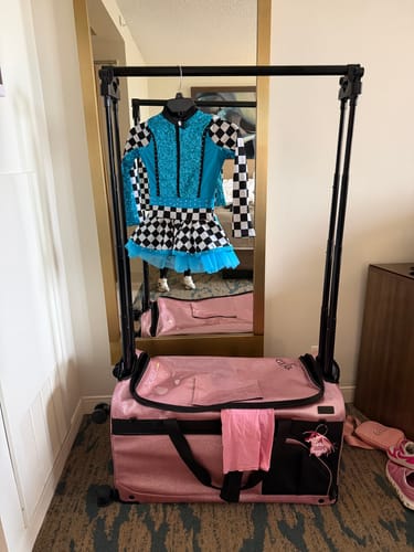 Customer photo review of Glam'r Gear Mobile Changing Station™ Dance Duffel Bag with Built-In uHide® Rack