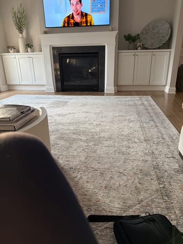 Reviewer's photo of a client's clean and tidy living room, showcasing the results of the cleaning products.
