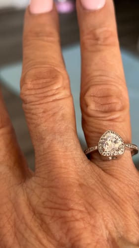Close-up of a customer wearing the Forever In My Heart Urn Ring, highlighting its sparkling heart-shaped design.