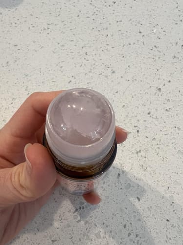 Customer photo review of Less Mess, More Glow: Organic Castor Oil With Rose Quartz Roll-On