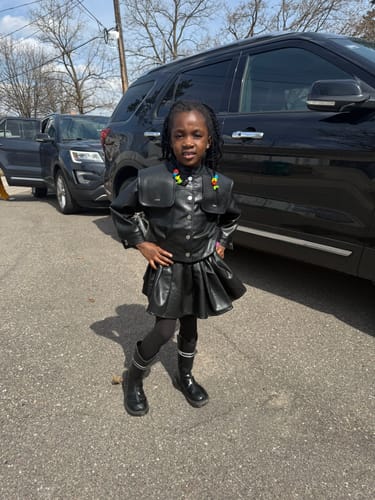 Customer photo review of New Girls' Lapel Leather Jacket and Skirt Two-Piece Set