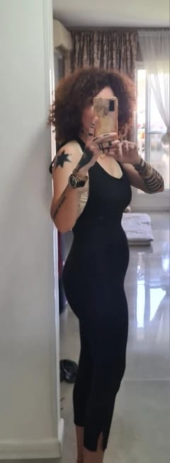 Customer photo review of Lucy Backless Halter Jumpsuit