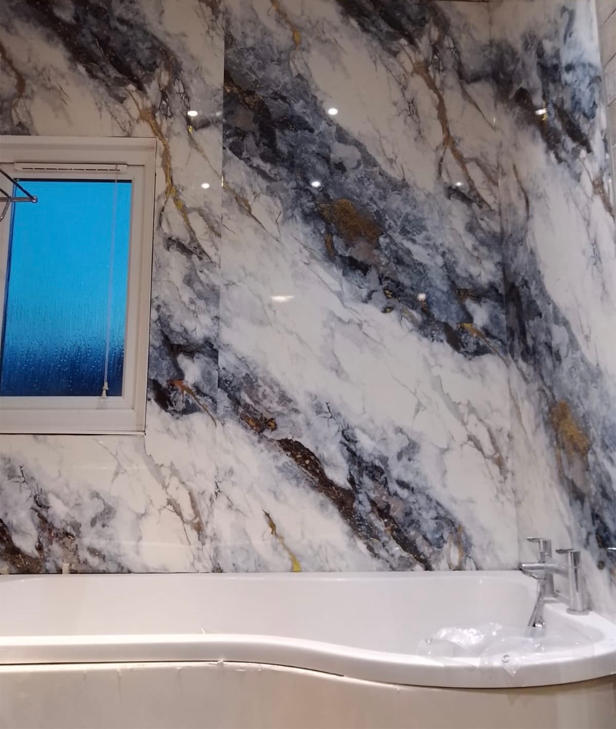 Customer photo review of 10mm Ocean Blue Gloss Shower Panel 1M x 2.4M