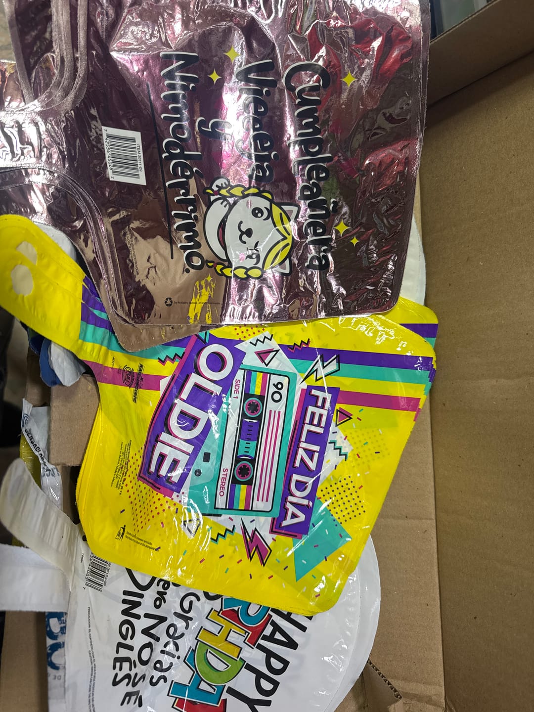 Customer photo review of PAQUETE GLOBOS METALICOS CUMPLEAÑOS 9" 50 PZS