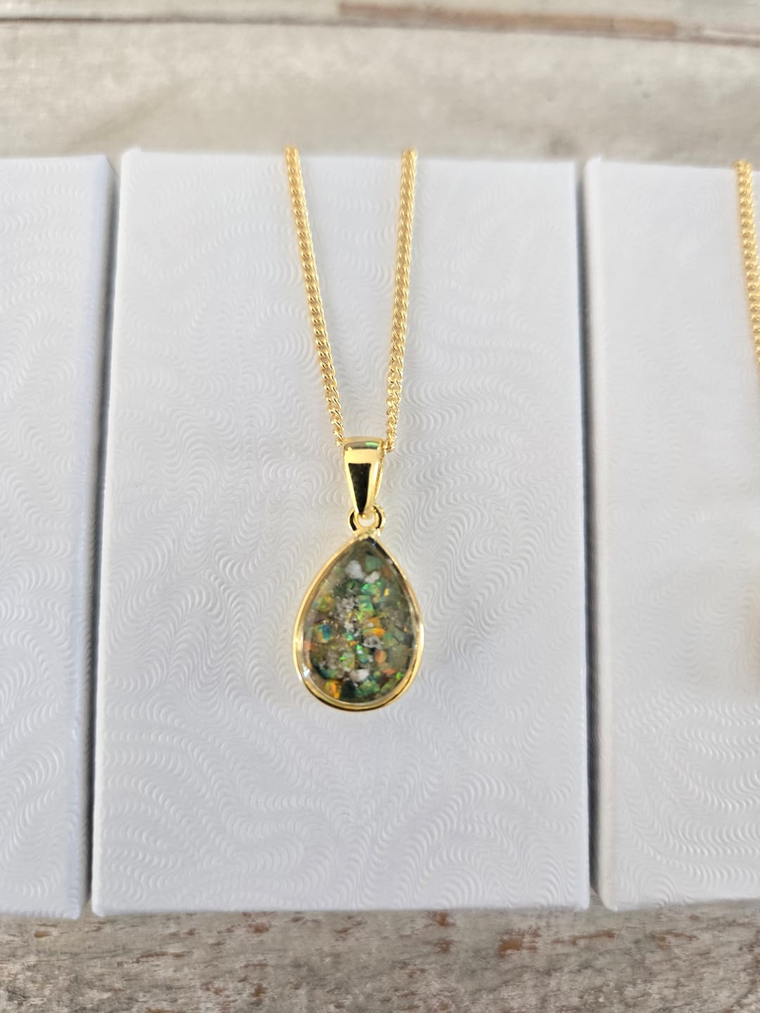 Customer photo review of Petite Pear Drop with Cremation Ashes