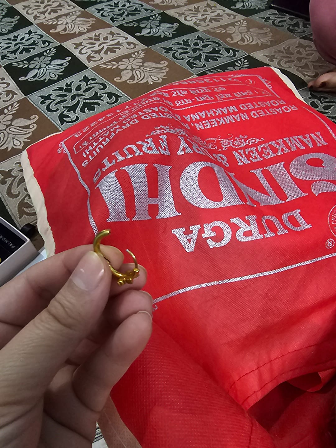 Customer photo review of Adorning Flora Gold Huggies
