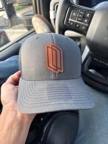Customer photo review of Custom Leather Patch Trucker Hat - Richardson 112