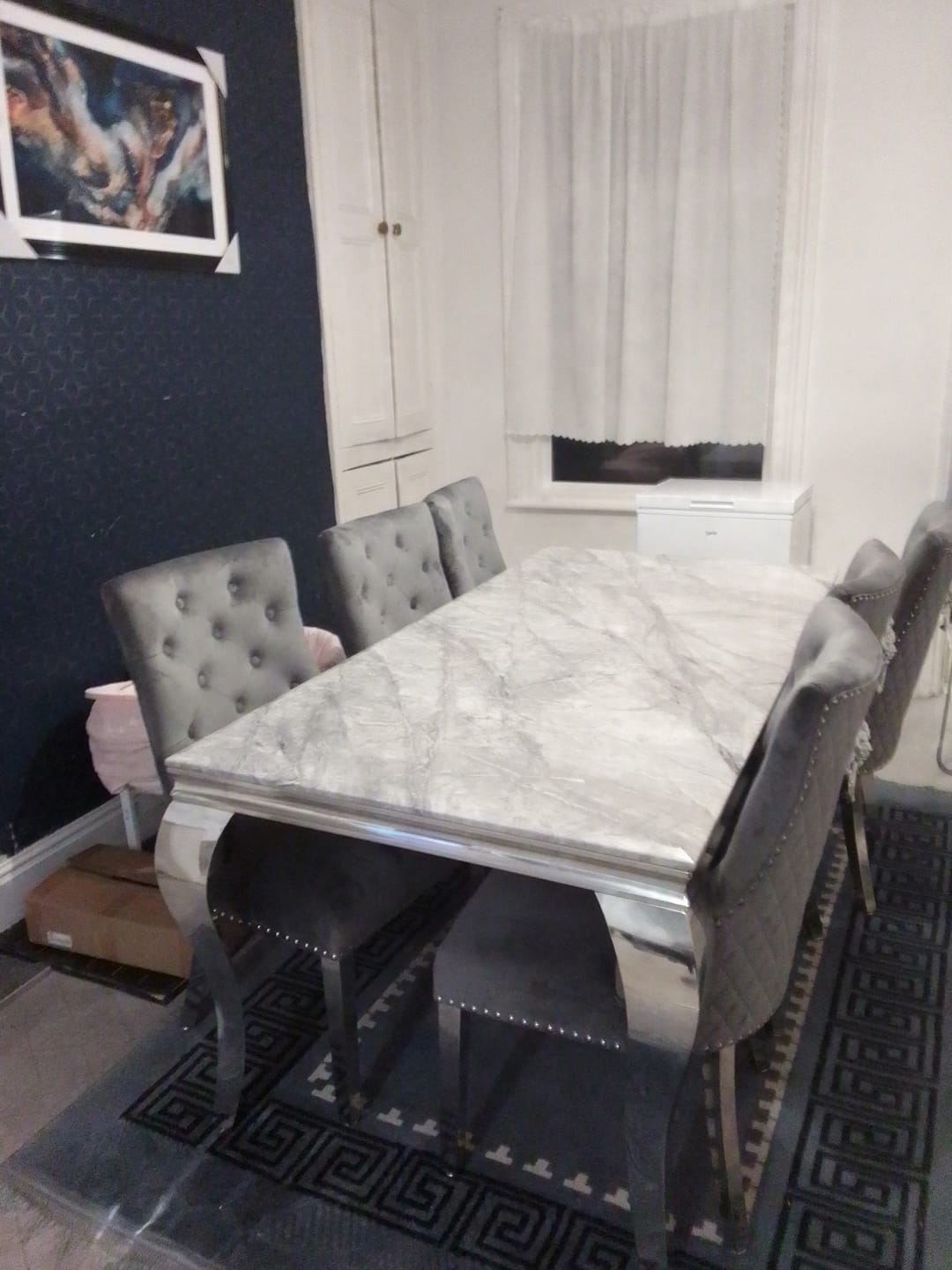 Customer photo review of Vienna Marble Dining Table With Bently Knocker Chairs lion
