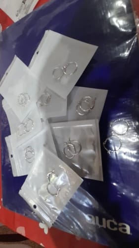 Customer photo review of Hypoallergenic Silver Twisted Circle Stud Earrings – Lightweight Everyday Earrings