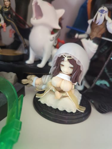 Customer's Dark Souls Series 2 mini-figure of a female character in a white dress and veil, shown on a shelf.