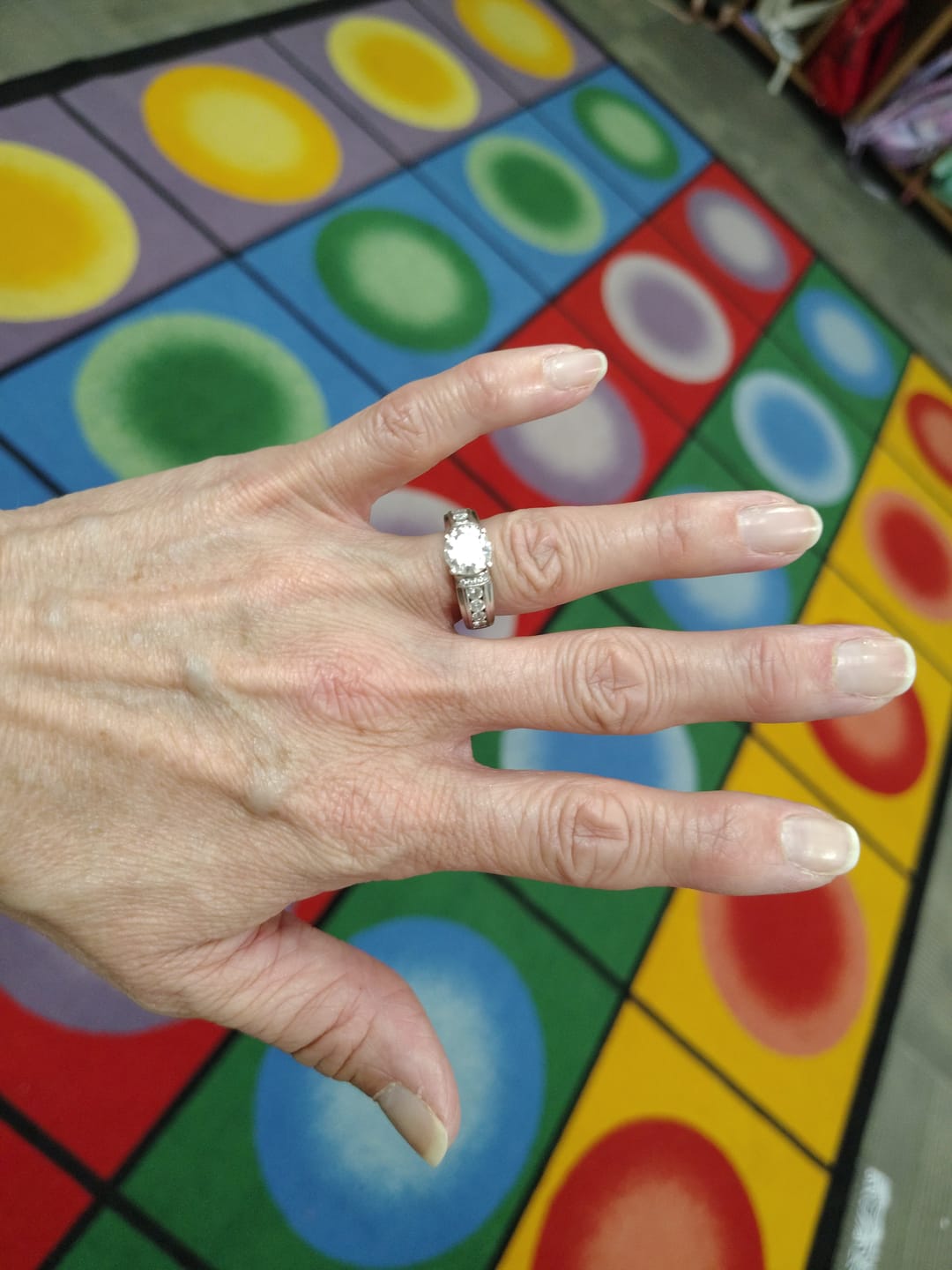 Customer photo review of Moissanite With Channel Set Sapphire Accents Engagement Ring