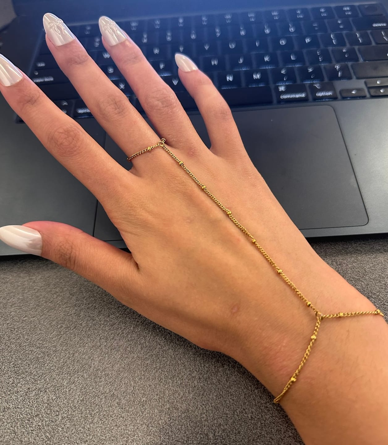 Customer photo review of 18K Gold Hand Chain Bracelet