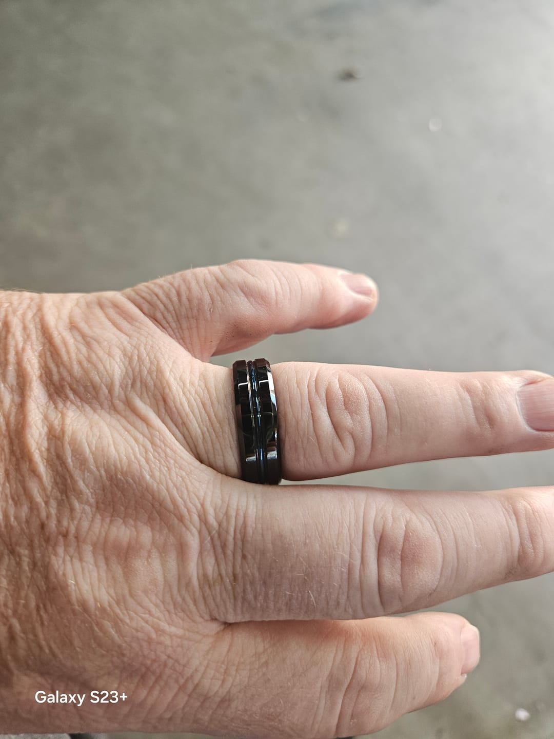 Customer photo review of 8mm Black Tungsten Carbide Wedding Band with Blue Center Groove