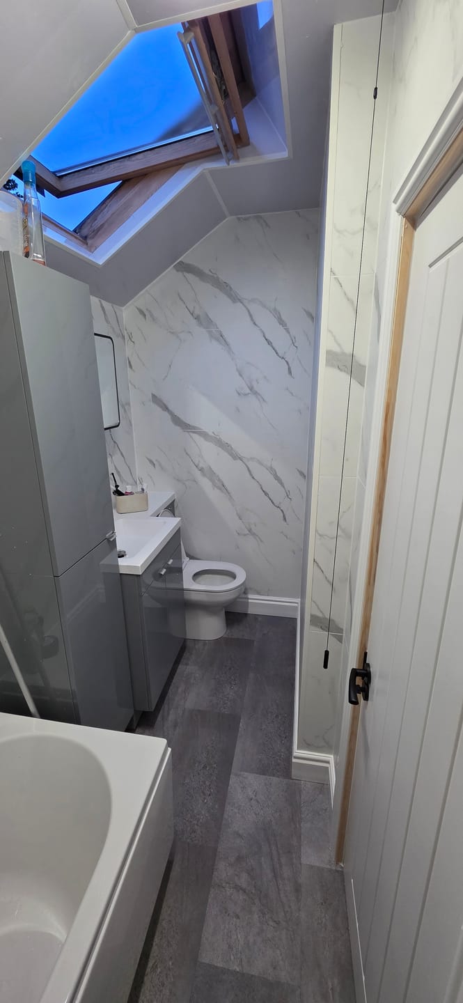 Customer photo review of 10mm Large Tile Carrara Marble Matt Shower Panel 1M x 2.4M