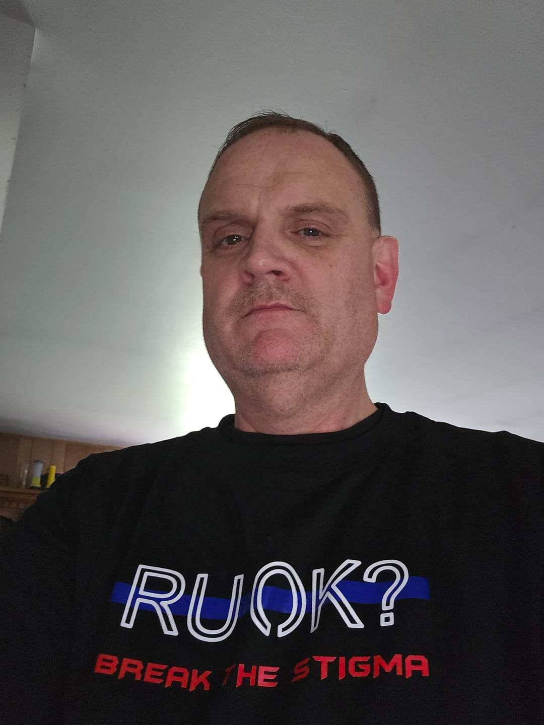 Customer photo review of Stigma-Breaking Unisex Tee- Blue Line
