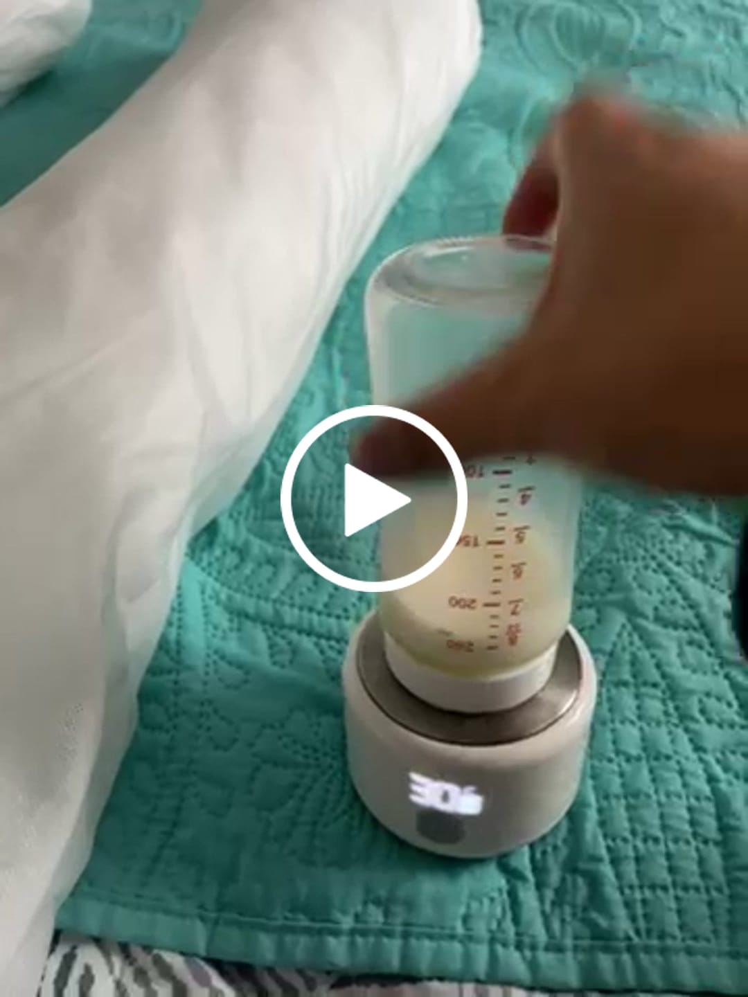 Customer video review of Calentador de mamaderas portátil