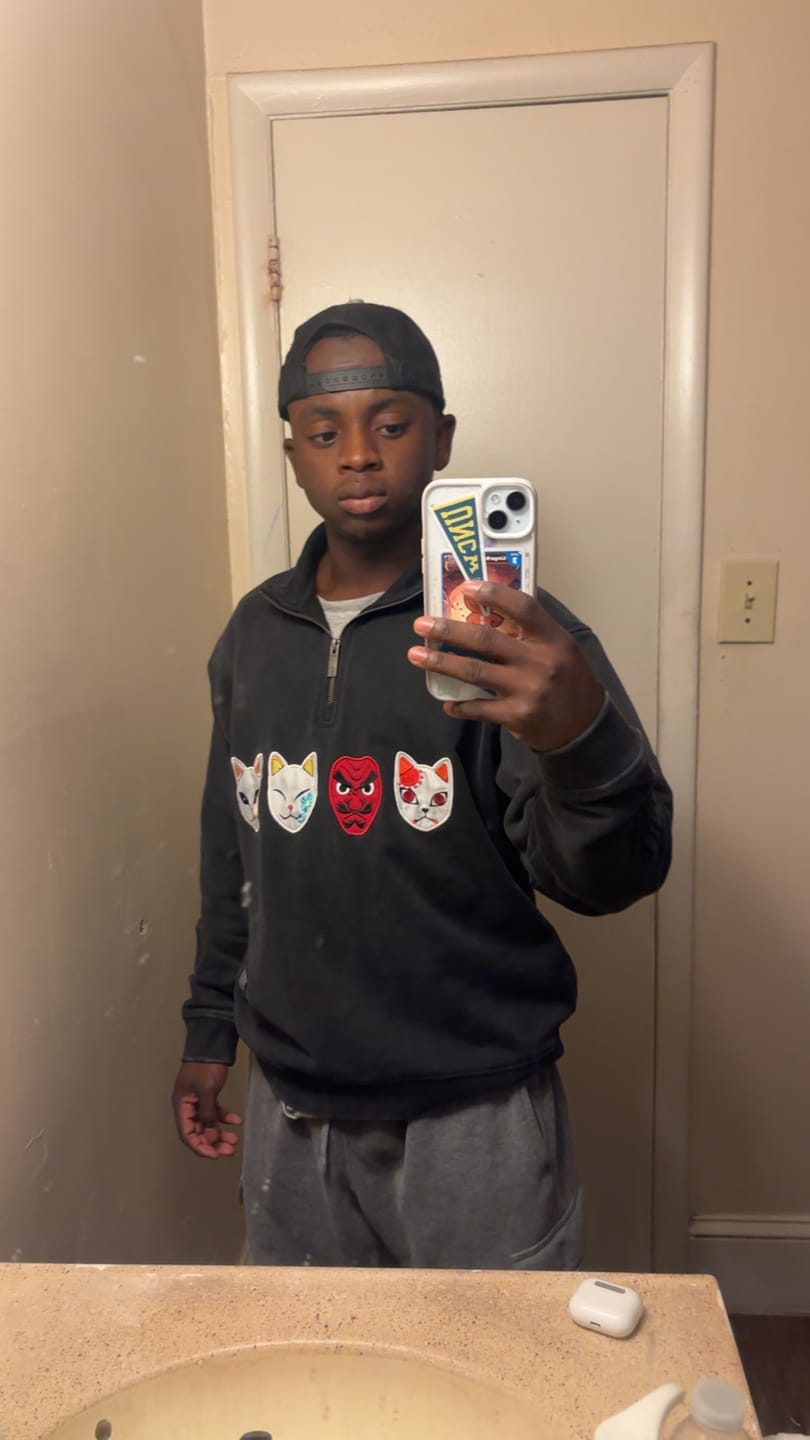 Customer photo review of 5197 - Demon Slayer: Kimetsu no Yaiba - Quarter Zip