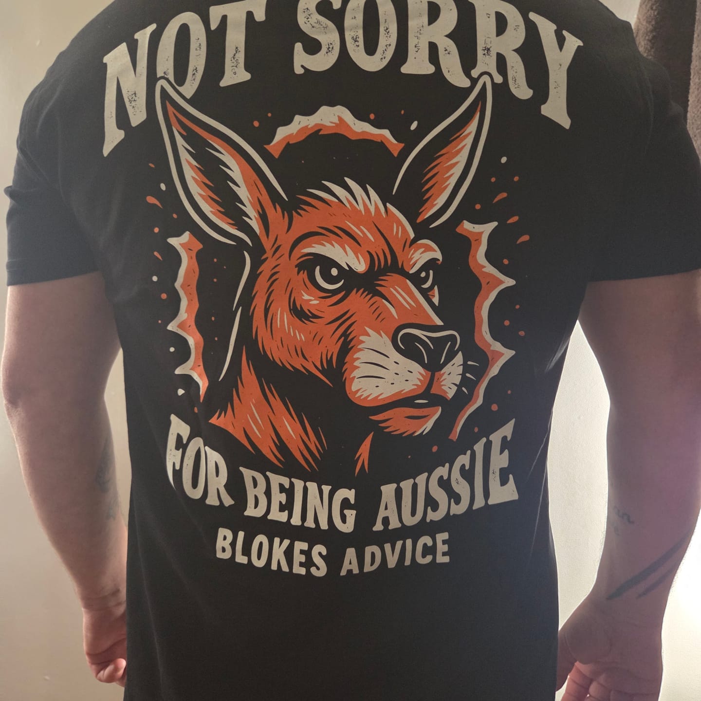 Customer photo review of Not Sorry Tee