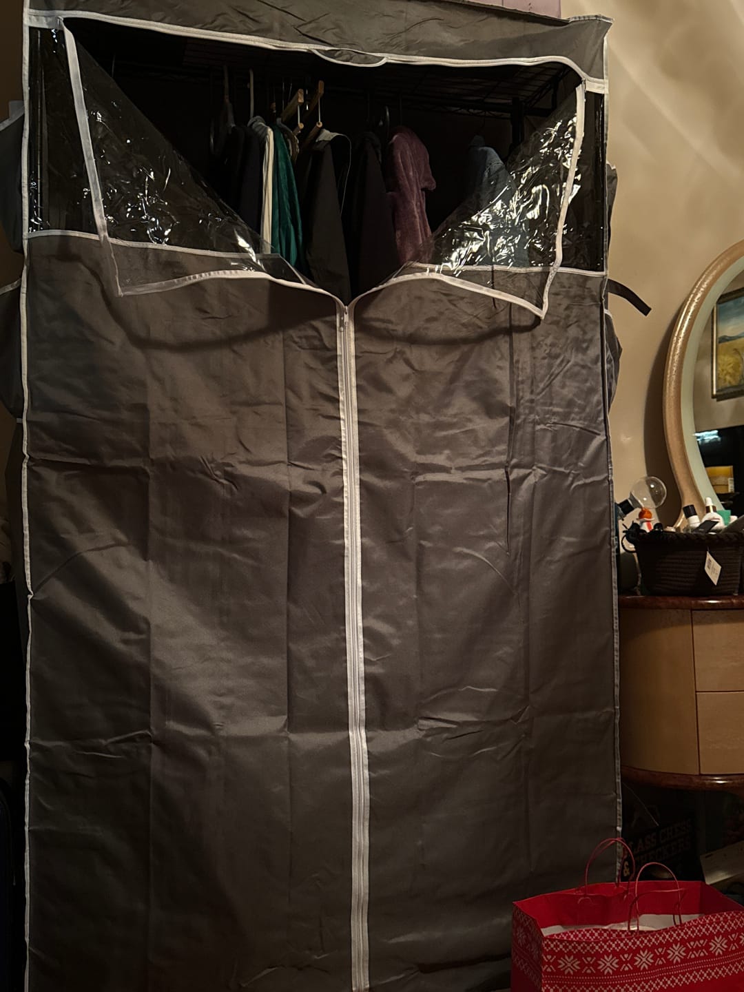 Customer photo review of Raybee Heavy Duty Portable Clothes Rack With Wheels,Clothing Rack For Hanging,Garment Rack For Bedroom