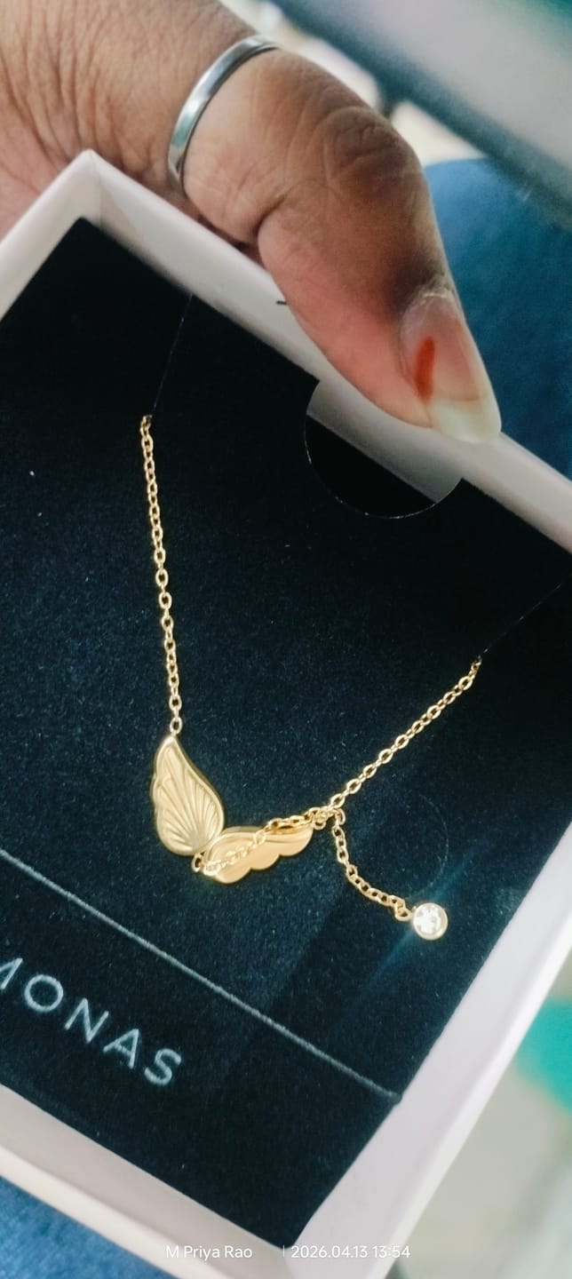 Customer photo review of Angel Wing Dangling Diamond Necklace