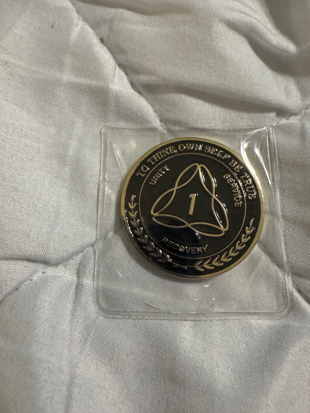 Customer photo review of 1 Year Sobriety Mint Infinity Triangle Gold Plated AA Recovery Medallions/Coins