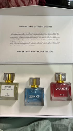 Customer's OUD Supreme BUNDLE in an open presentation box, showing the three glass perfume bottles inside.