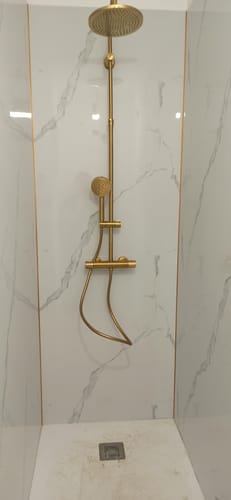 Customer photo review of Panneau Mural PVC Effet Marbre Doré – Étanche et facile à poser