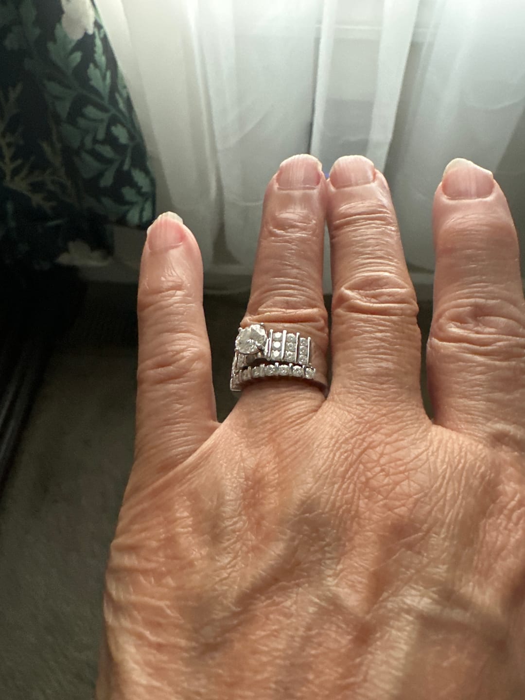 Customer photo review of Moissanite With Bar Set Accents Bridal Engagement Ring Set