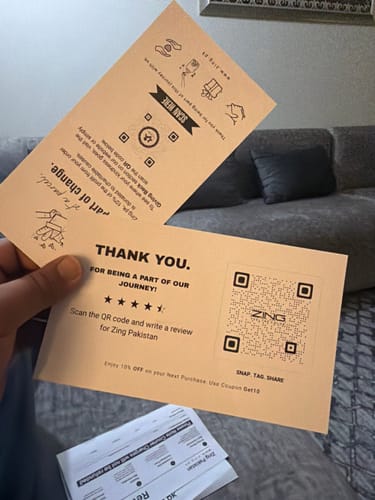Reviewer holding thank you cards included with their OUD Supreme BUNDLE order.