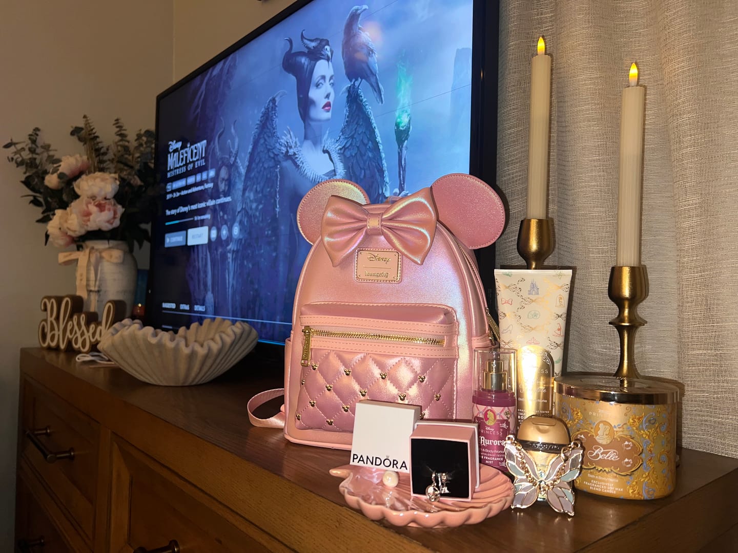 Customer photo review of Loungefly Disney The Minnie Mouse Classic Series Mini Backpack: Rose Iridescent - 707 Street Exclusive