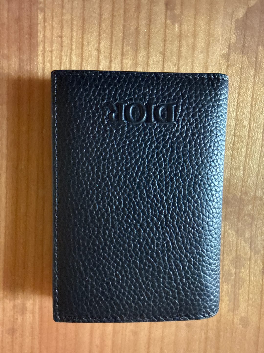 Customer photo review of Camel and Black Wallet