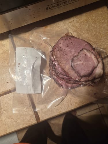 Customer's Halal Sliced Roast Beef in its vacuum-sealed package on a countertop.