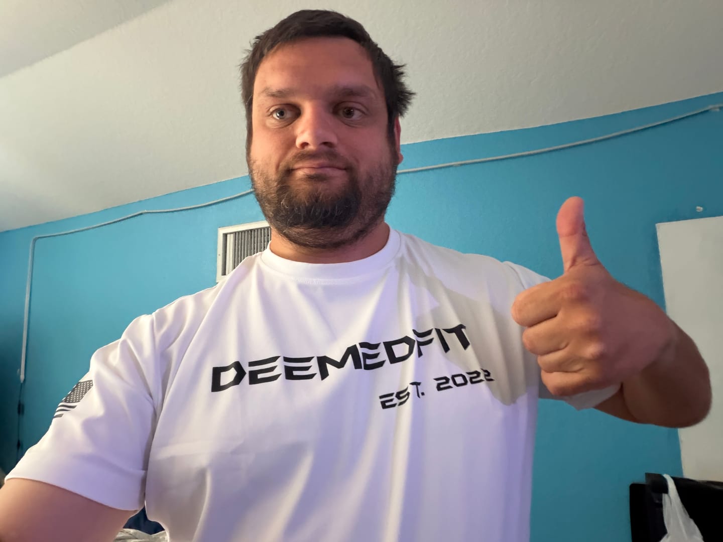 Customer photo review of Men’s Gym Tee “Compellence” - White