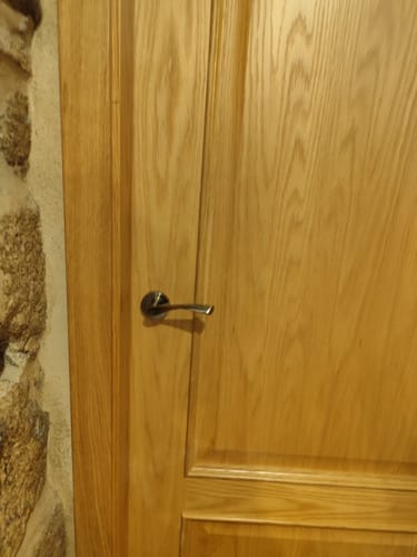 Customer photo review of Manilla modelo 'ola 130C' con Roseta Redonda en acabado cuero para puertas