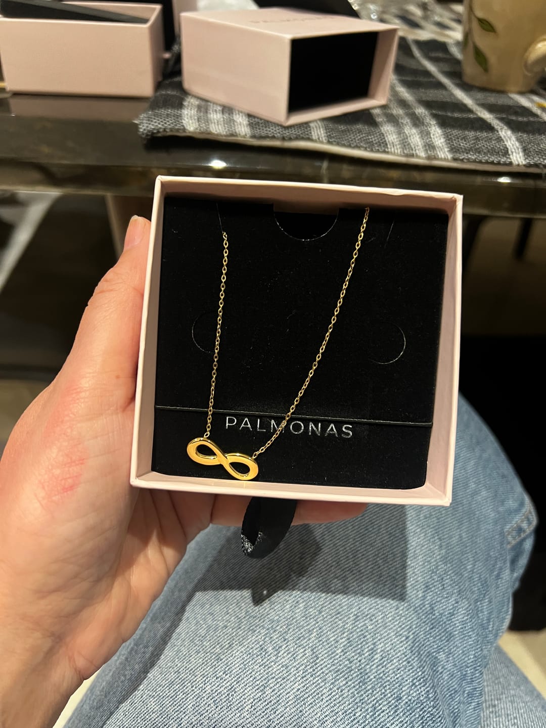 Customer photo review of Golden Infinity Necklace