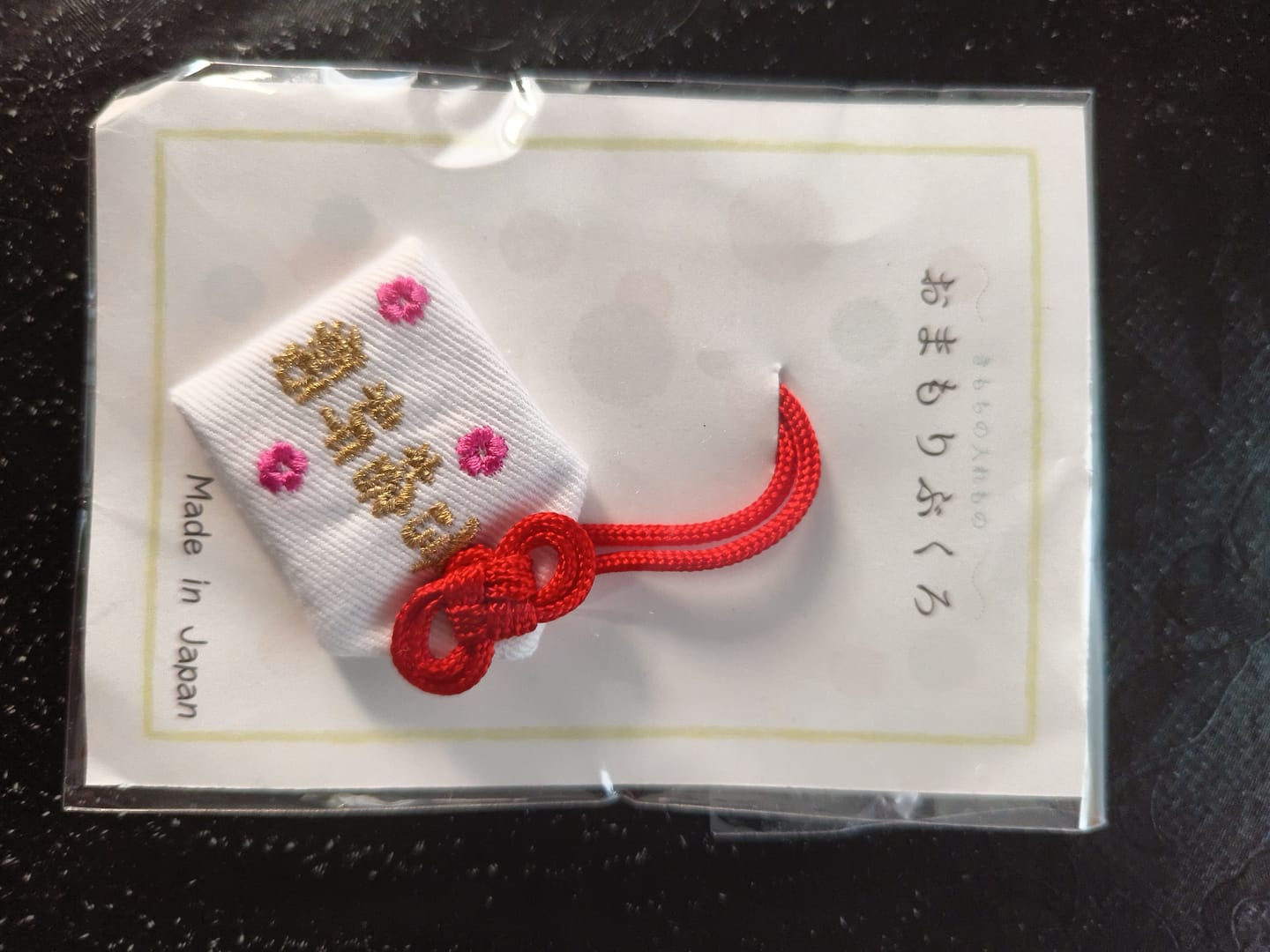 Customer photo review of Amuleto Omamori Aprobado