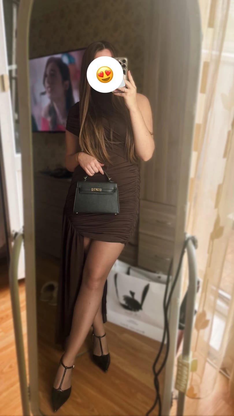 Customer photo review of Jenny High Neck Ruched Mini Dress