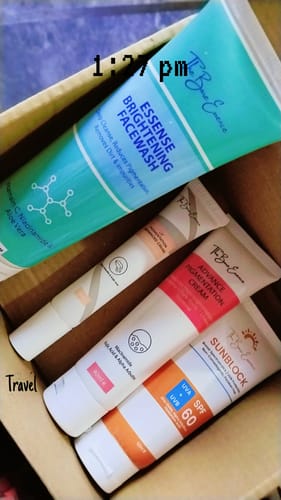 Customer's All Glow Pigmentation Bundle products, including facewash, cream, and sunblock, displayed in a cardboard box.