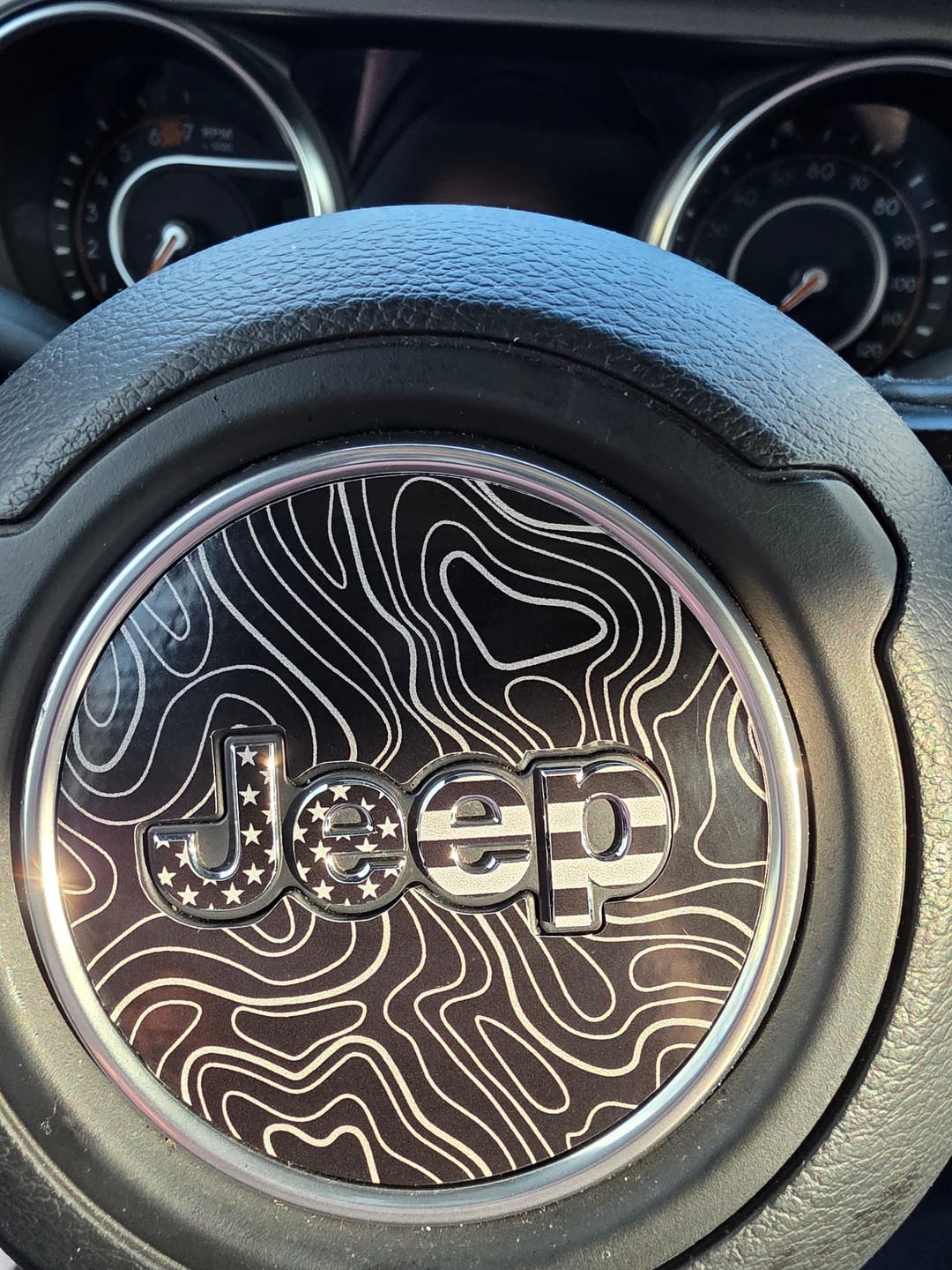 Customer photo review of JEEP Steering Wheel Emblem Overlay Decal — 30+ Colors & Designs (Flag, Topo, Animal, Solid)
