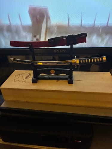 Customer photo review of Crimson Red Katana Letter Opener Sword