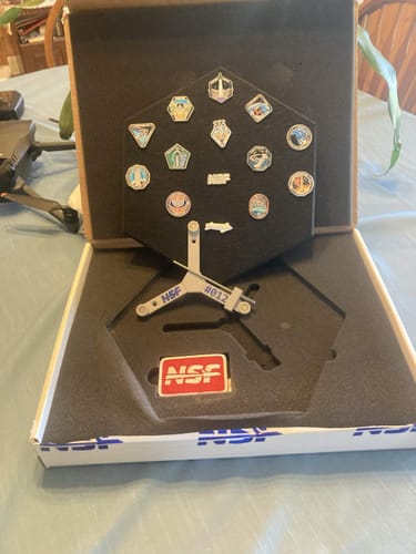 Customer's Starship Flight Pin Collection in its open box, showing the display tile with pins and the #012 serialized mount.