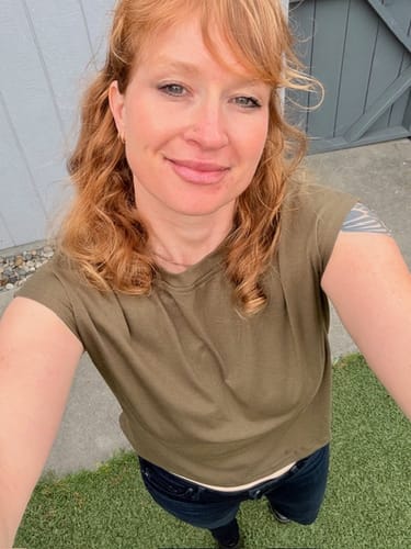 Reviewer's selfie showing her smooth facial skin after using the Seranova Micro Infusion System.