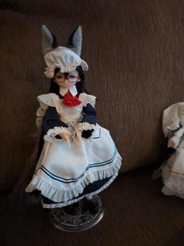 Customer's Transform Electrical Street Series action figure in a custom maid outfit with glasses, animal ears, and a red bow.
