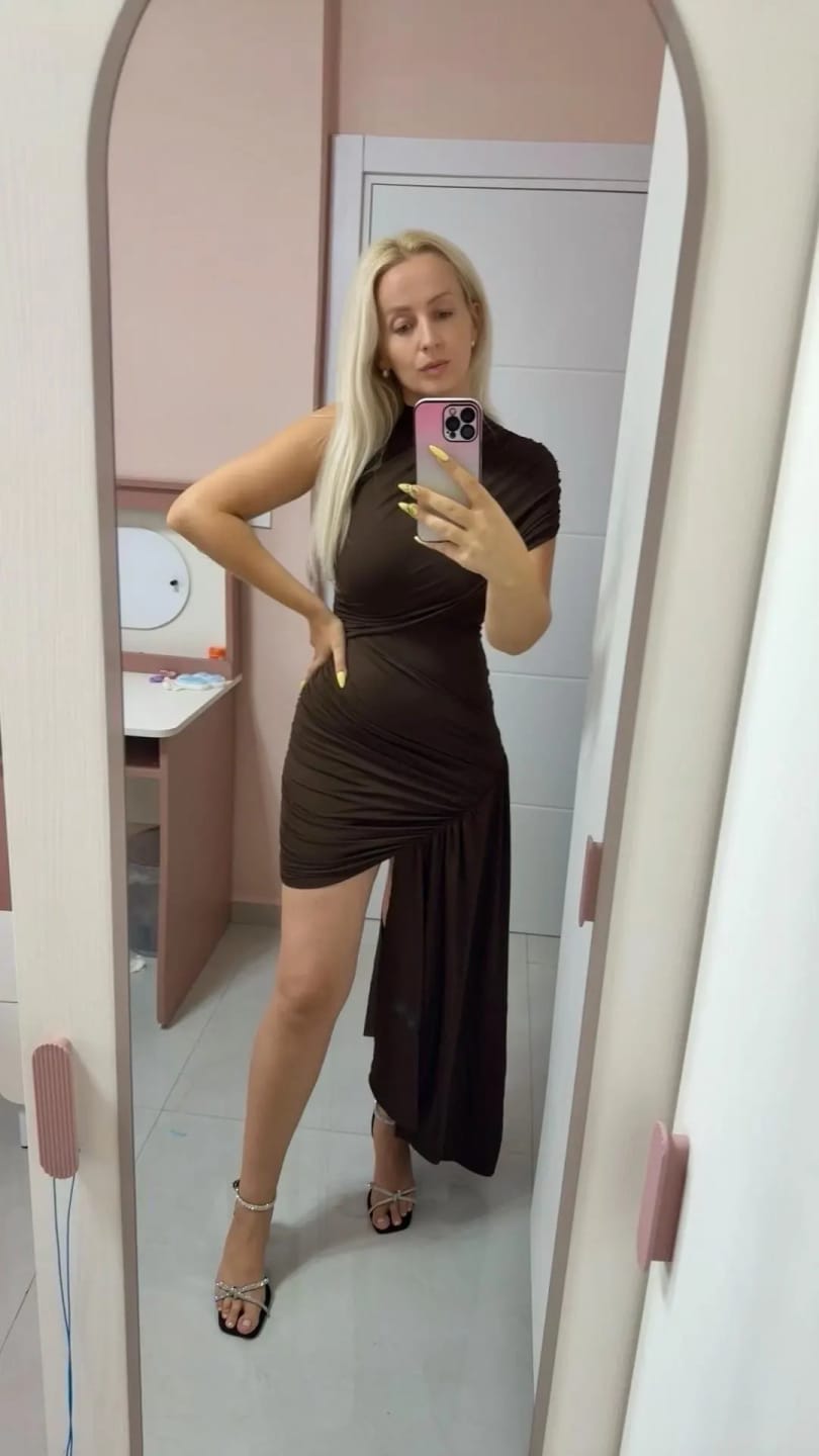 Customer photo review of Jenny High Neck Ruched Mini Dress