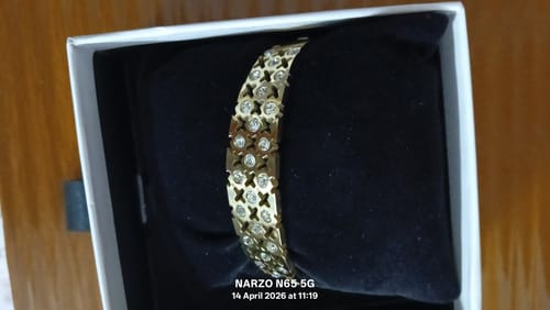 Customer photo review of Shimmering Star Gold Bangle Bracelet
